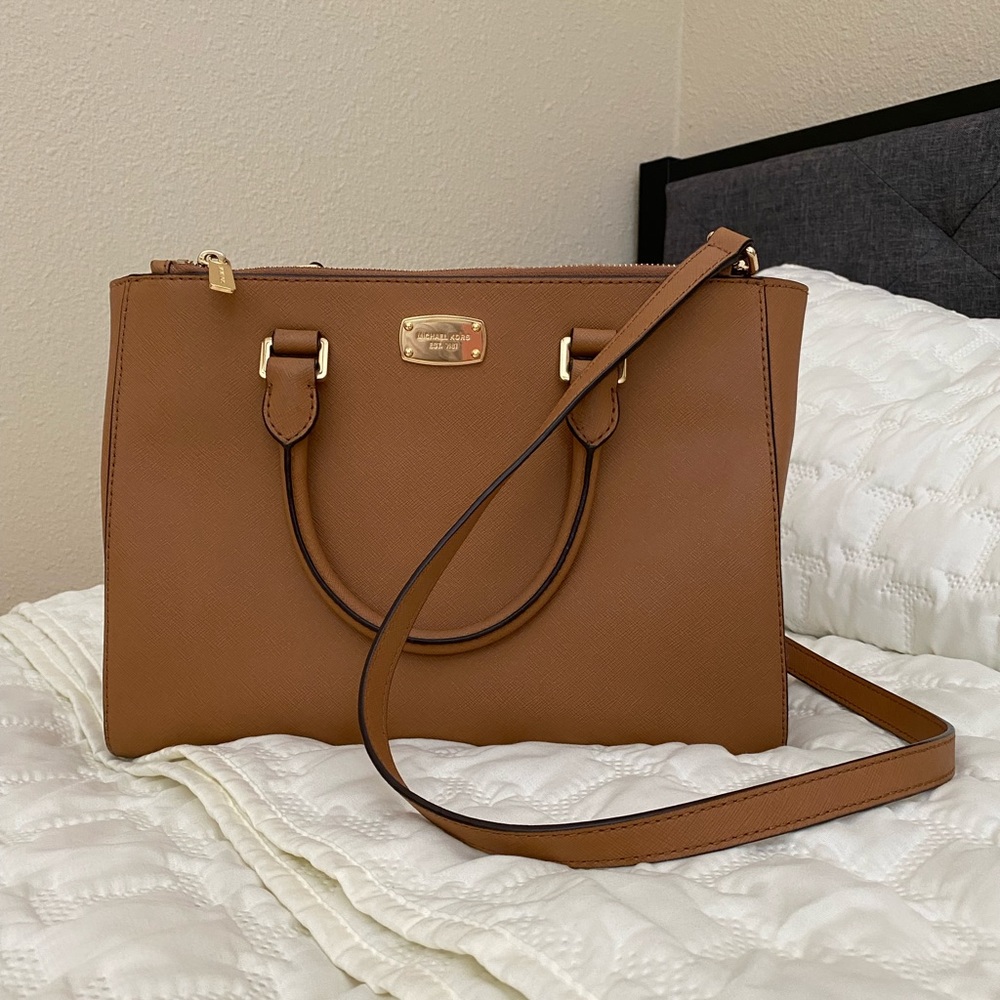 Michaels Kors bag in luggage